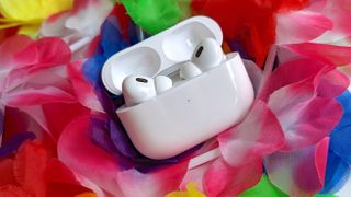 AirPods deals, AirPods Pro 2 set on a flower backdrop