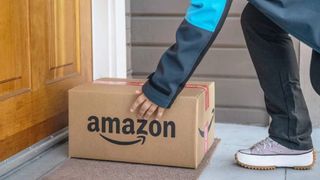 Amazon Big Spring Sale deals delivery person dropping off Amazon package at front door 